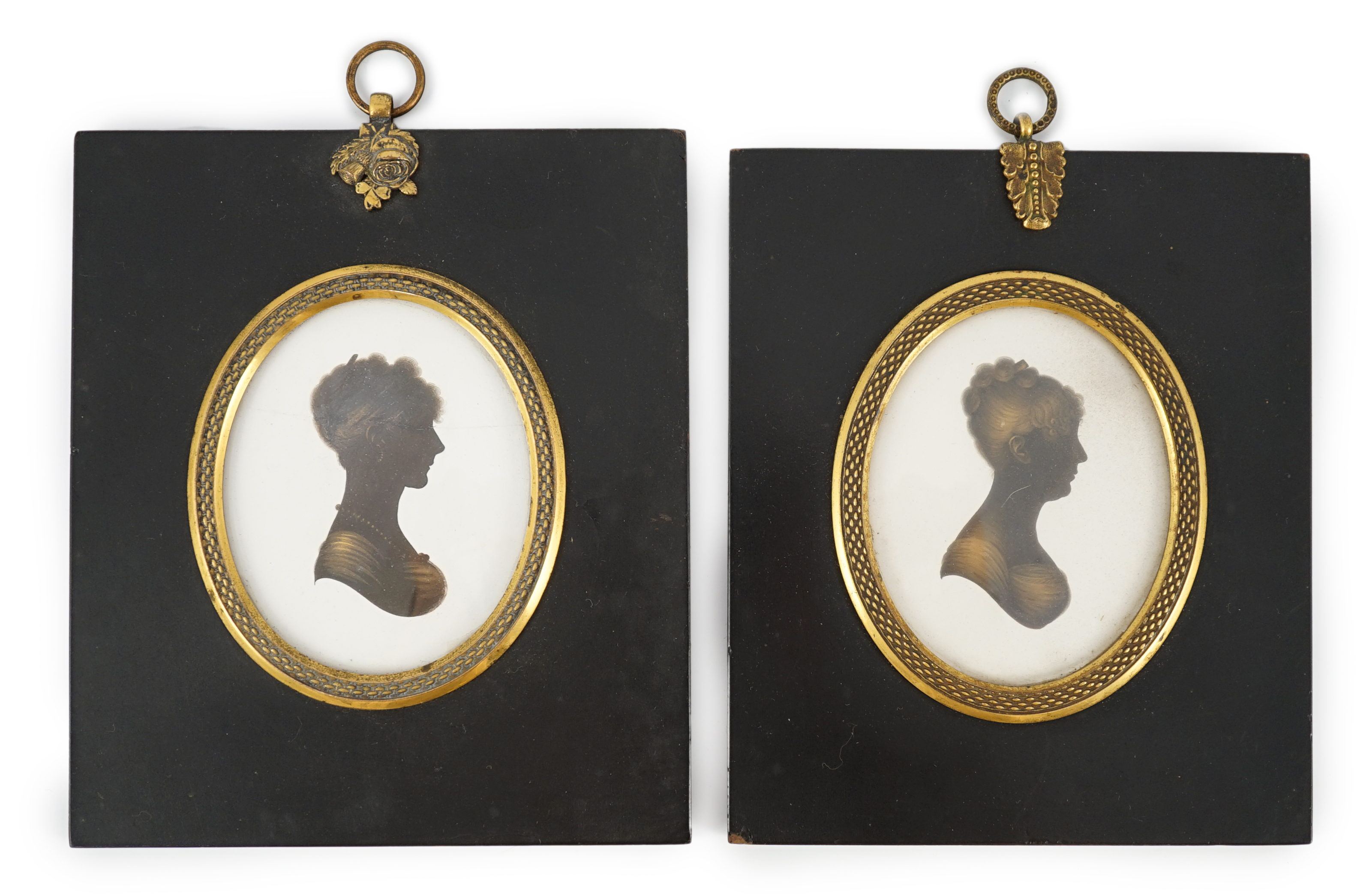 John Miers (1756-1821), Silhouettes of young ladies, painted and bronzed plaster (2), 8 x 6.5cm.